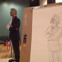 Photo from Eau Claire Artist's Drawing Night event with a model dressed as Two-Face from Batman